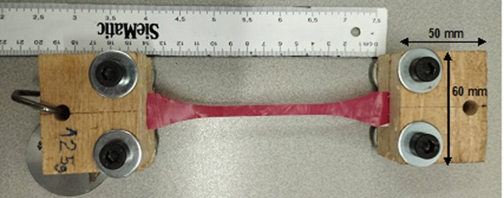 Figure 9. DIY tensile grips with mounted tensile specimen.